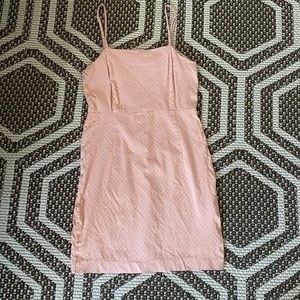 Baby pink bodycon dress with white polka dots